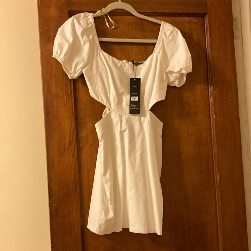 SundaeMuse size 6 white mini dress with cut in sides and back zipper